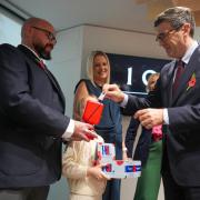 Prime Minister Andy Burnham speaks to British Army veteran Steven Knighton, at No 10 North in Manchester, as he donates and receives his poppy in support of this year’s Poppy Appeal (Christopher Furlong/PA)