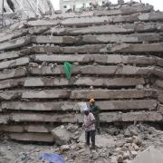 Security forces and civil defence work after a multi-story building collapsed in Nairobi, Kenya (Brian Inganga/AP)