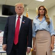 Mr Trump was joined by first lady Melania Trump at the event (AP)