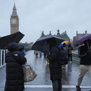 An amber weather warning is in place across many areas (Yui Mok/PA)